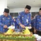 Pj bupati Muaro Jambi Dampingi Kadis Pendidikan Potong Tumpeng